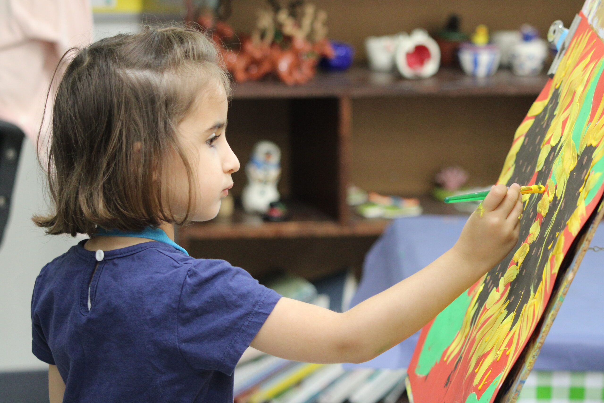 Girl in Early Childhood Art Education class at Washington Episcopal School